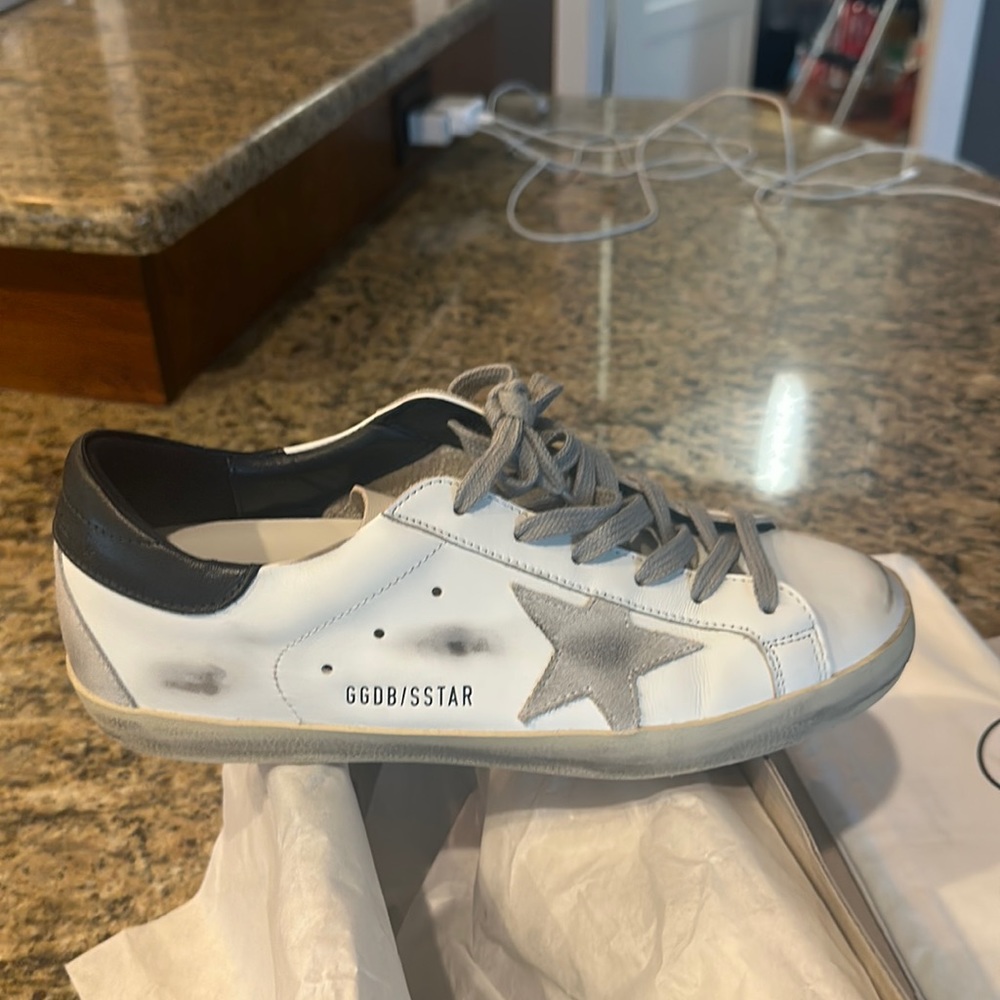 Brand new Golden Goose, Size 39. White with Navy back and gray laces.